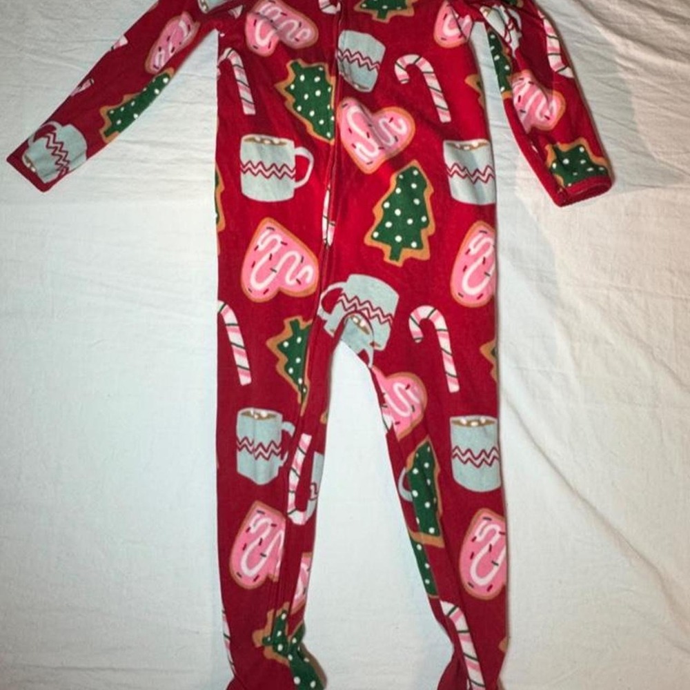 Cute red Christmas onesie with candy canes and cookies. Size: 5 years